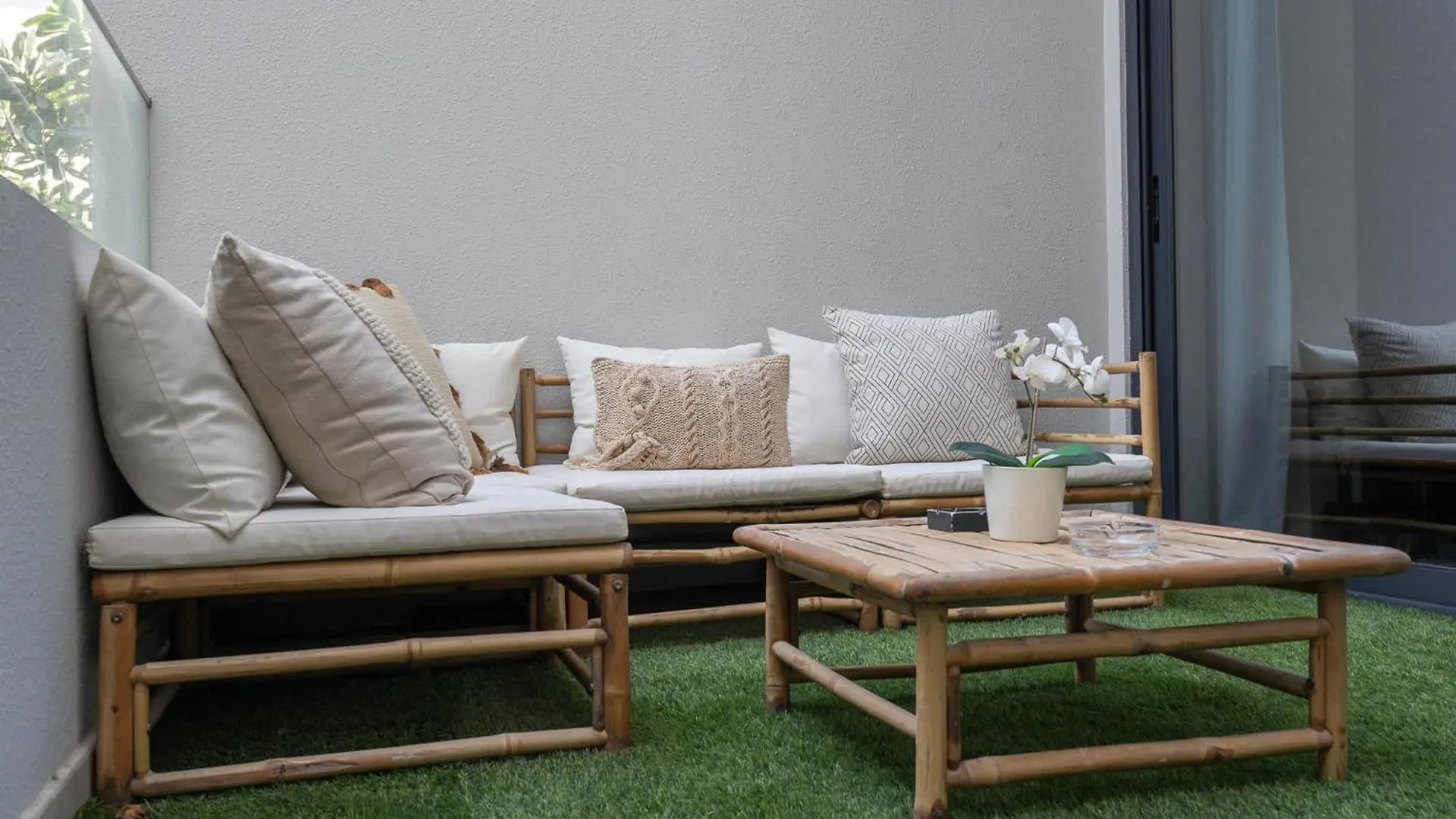 Minimalist Studio With Nature-Inspired Balcony In Jvc Dubai Apartment