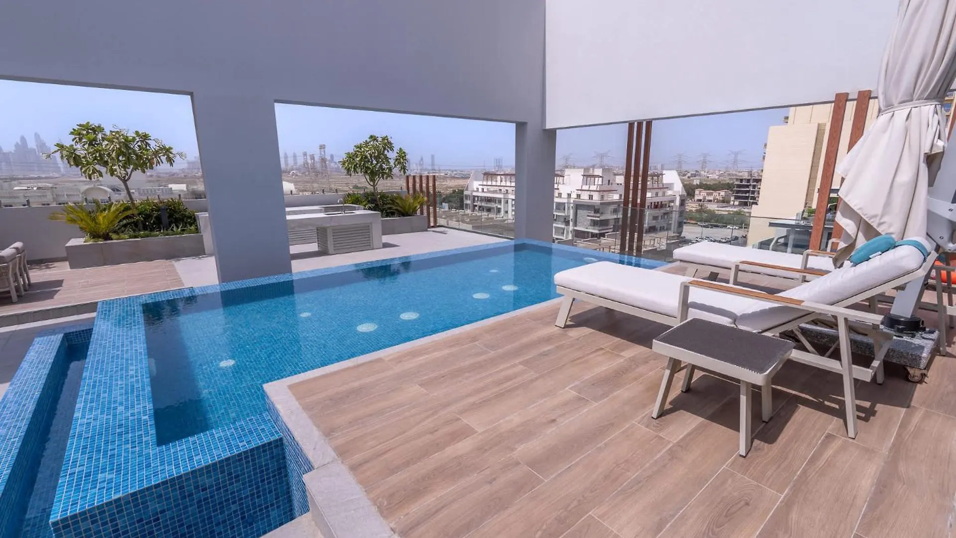 Minimalist Studio With Nature-Inspired Balcony In Jvc Dubai United Arab Emirates