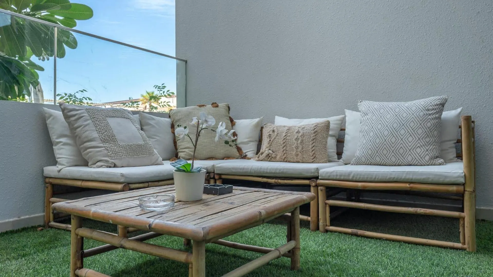 Minimalist Studio With Nature-Inspired Balcony In Jvc Dubai Apartment