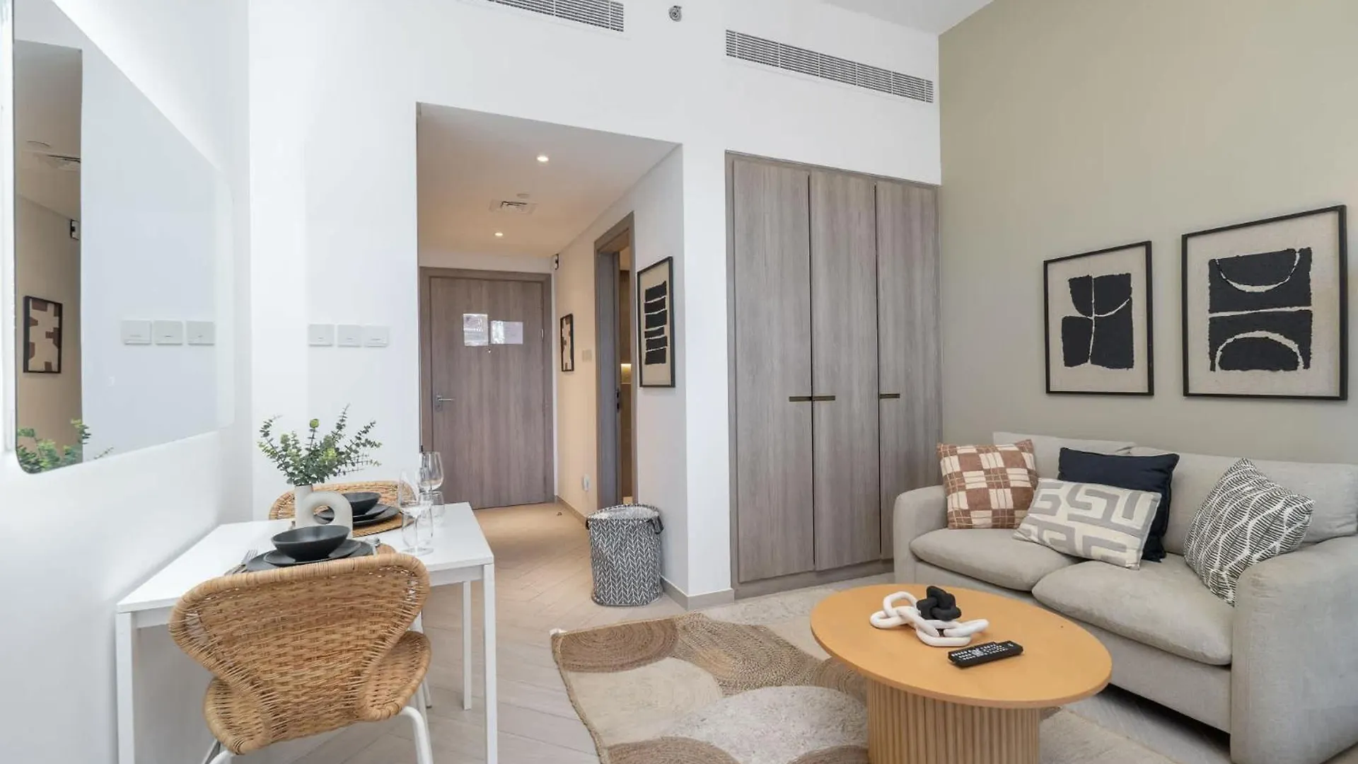 Apartment Minimalist Studio With Nature-Inspired Balcony In Jvc Dubai