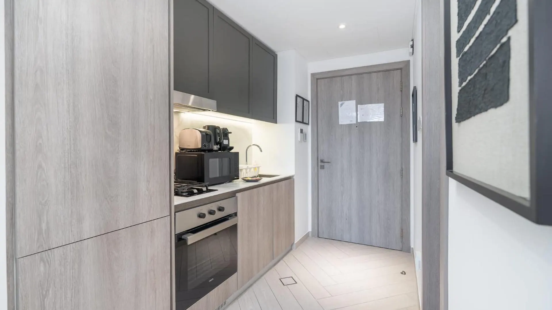 Apartment Minimalist Studio With Nature-Inspired Balcony In Jvc Dubai